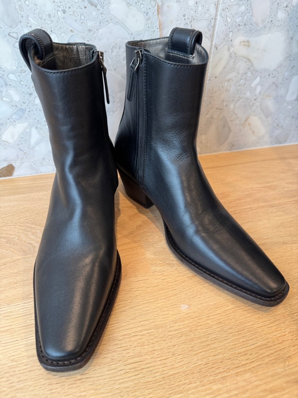 Brunello Cucinelli women’s Black Leather Zip Ankle Boots - luxury